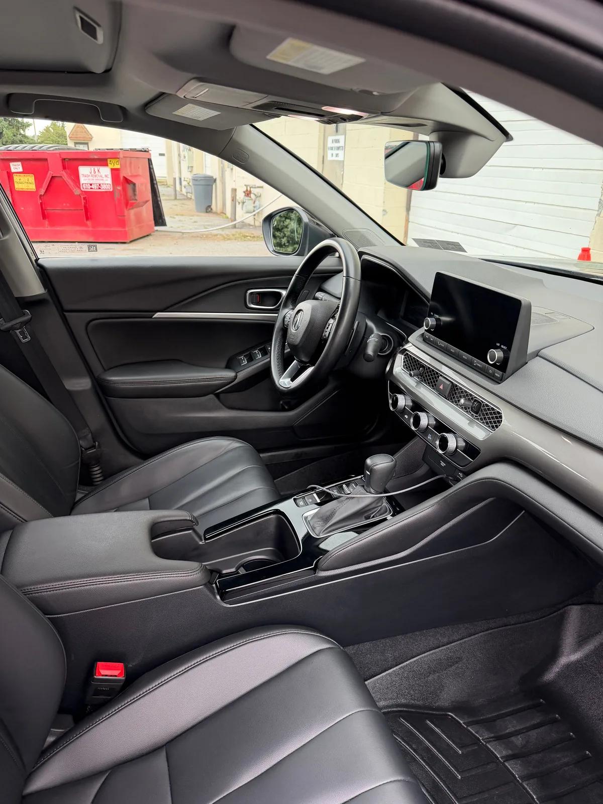 Acura Integra black leather interior after an interior detail. GNelson Detailing West Chester PA