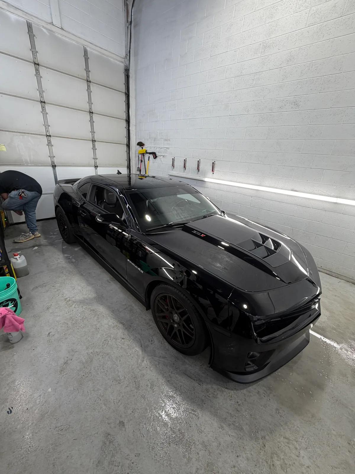 Black Chevrolet Camaro in the detail bay — GNelson Detailing West Chester PA