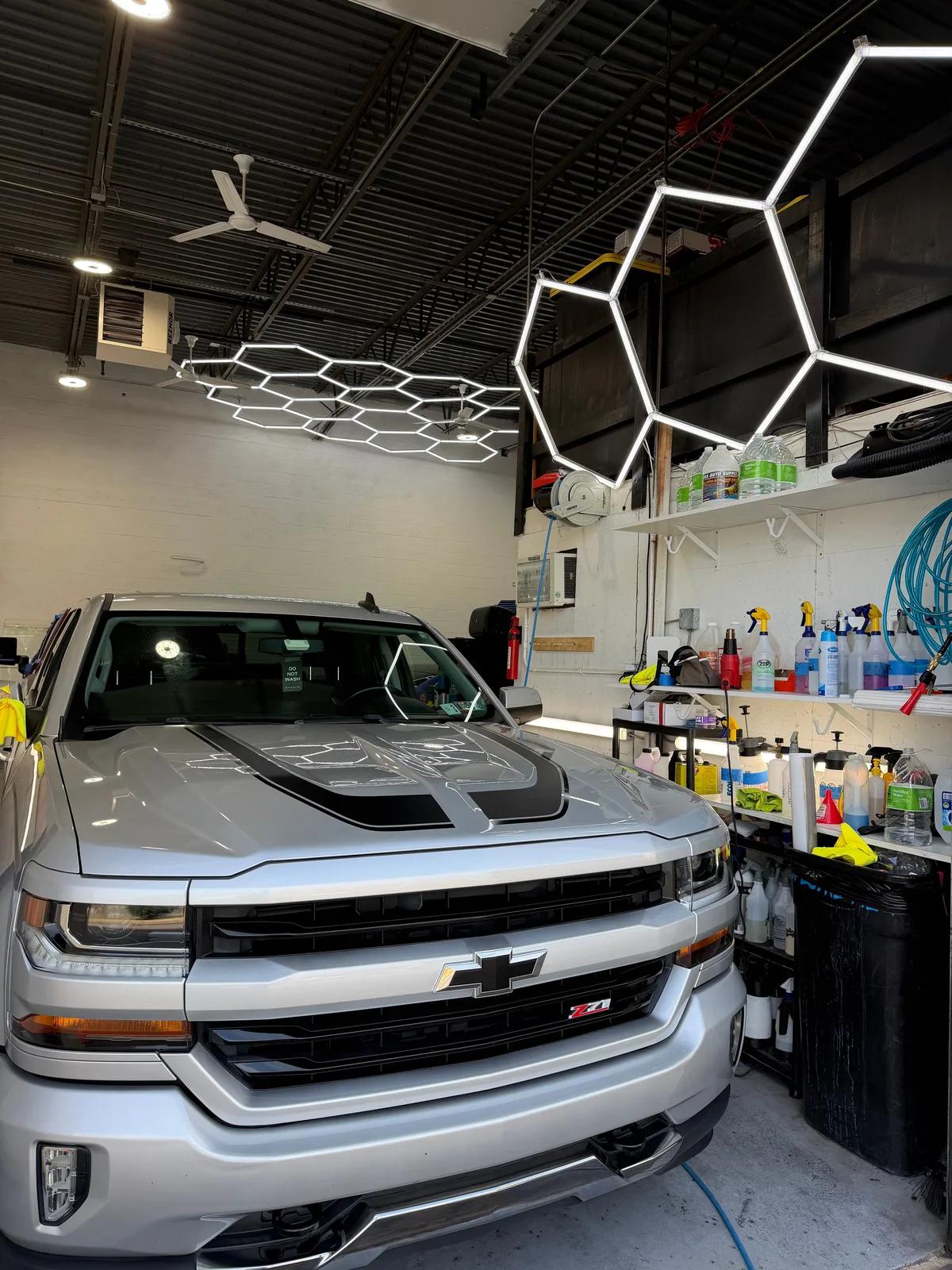 Silver Chevrolet Silverado Z71 in the detail bay after a FEYNLAB ceramic coating. GNelson Detailing West Chester PA