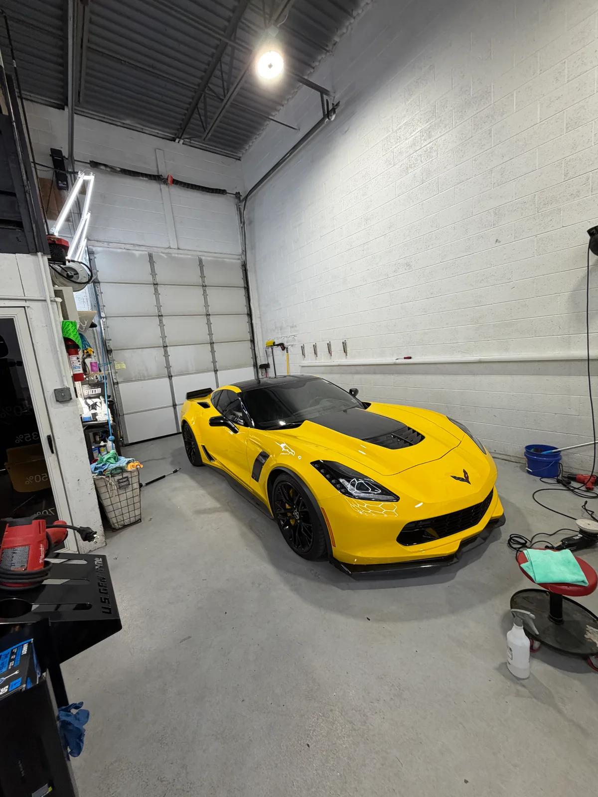 Yellow Chevrolet Corvette Z06 in the detail bay — GNelson Detailing West Chester PA
