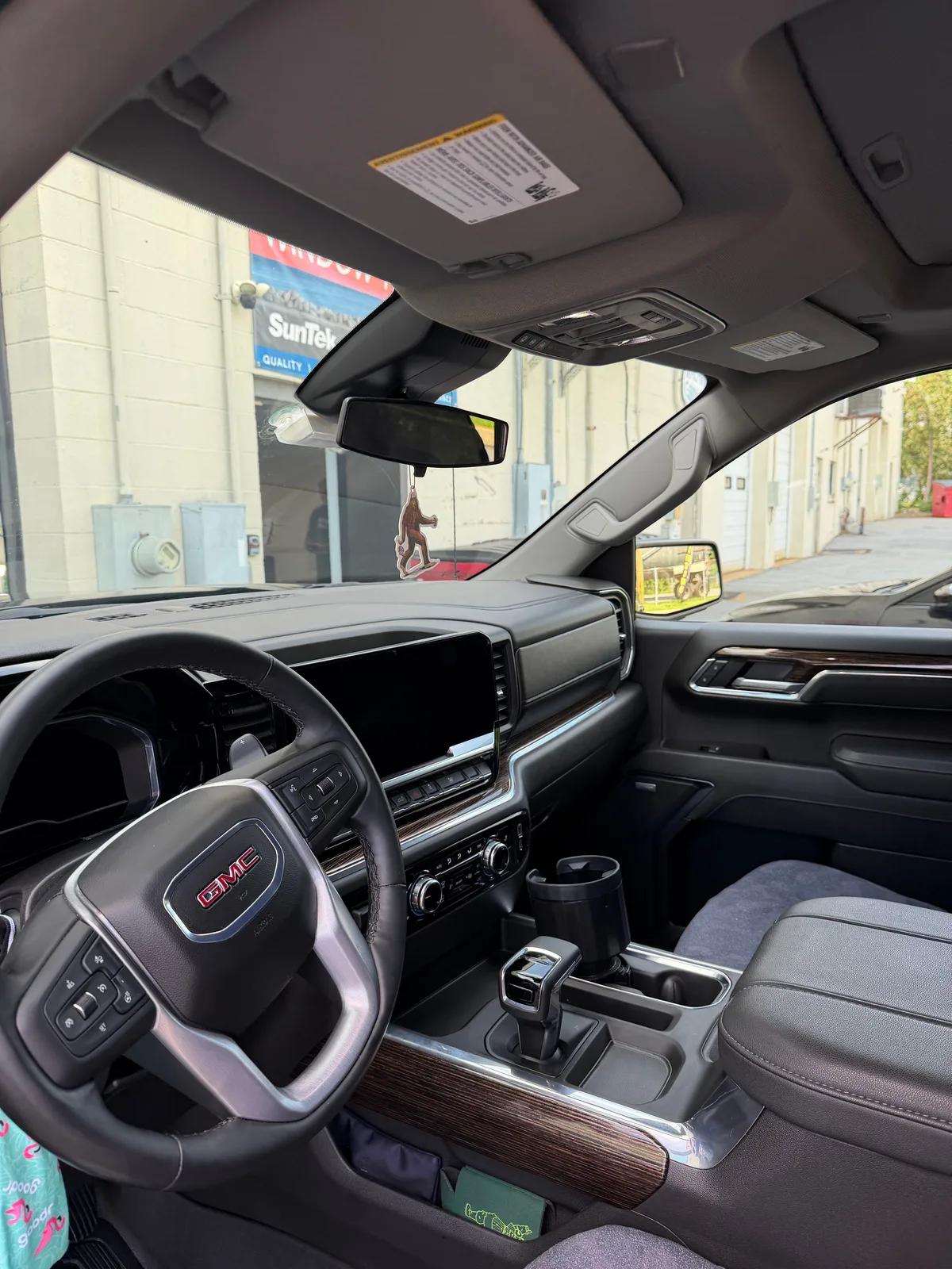 GMC Sierra dash and steering wheel after an interior detail. GNelson Detailing West Chester PA
